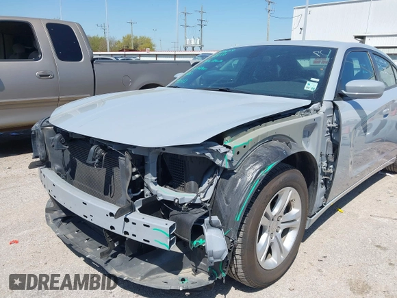 2022 Dodge Charger SXT with VIN 2C3CDXBG7NH204659, listed as a IAAI auction lot 41882695 with 49,773 mi miles and . Bid and sale history available at DreamBid. Image 6.