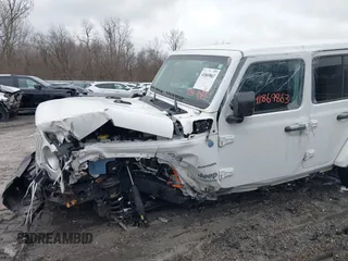 2021 Jeep Wrangler Unlimited Sahara with VIN 1C4JJXP60MW830307, listed as a IAAI auction lot 41869863 with 37,201 mi miles and . Bid and sale history available at DreamBid. Image 6.