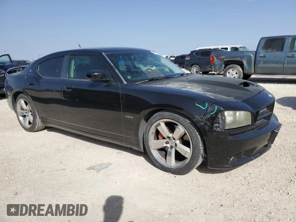 2008 Dodge Charger SRT-8 with VIN 2B3KA73W48H284076, listed as a Copart auction lot 48109825 with 156,174 mi miles and Salvage Title. Bid and sale history available at carsss.com. Image 4.