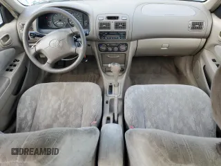 1999 Toyota Corolla VE with VIN 2T1BR12E7XC113103, listed as a Copart auction lot 63849025 with 104,830 mi miles and Salvage title. Bid and sale history available at DreamBid. Image 8.