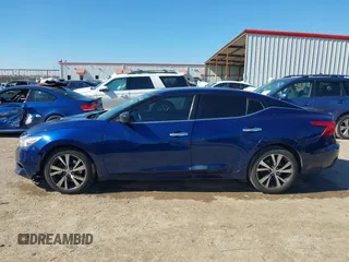 2016 Nissan Maxima SR with VIN 1N4AA6AP6GC398426, listed as a IAAI auction lot 41468260 with 153,716 mi miles and . Bid and sale history available at DreamBid. Image 14.