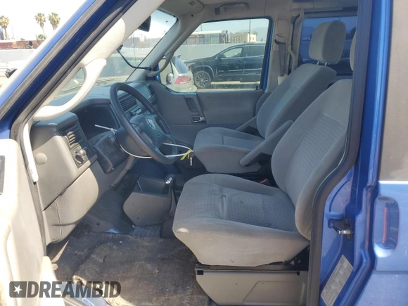 2003 Volkswagen EuroVan с VIN WV2KB470X3H028721, выставлен на аукционе Copart как лот 57531425 с пробегом 233 629 миль миль и Чистый • Clean title. История ставок и продаж доступна на DreamBid. Изображение 7.