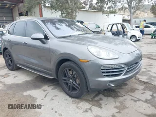2012 Porsche Cayenne S Hybrid with VIN WP1AE2A25CLA90636, listed as a IAAI auction lot 41922089 with 90,318 mi miles and . Bid and sale history available at DreamBid. Image 1.