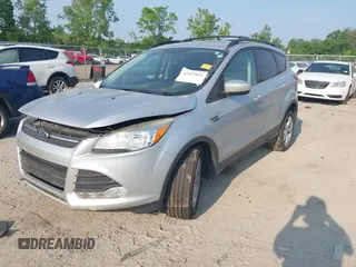2014 Ford Escape SE with VIN 1FMCU9G96EUB25154, listed as a IAAI auction lot 42417612 with 176,916 mi miles and . Bid and sale history available at DreamBid. Image 17.