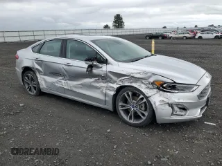 2019 Ford Fusion Titanium with VIN 3FA6P0D99KR242616, listed as a Copart auction lot 57525635 with 79,518 mi miles and Salvage title. Bid and sale history available at DreamBid. Image 4.