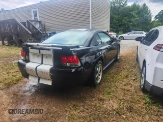2002 Ford Mustang Standard with VIN 1FAFP40412F170034, listed as a Copart auction lot 61275825 with 174,868 mi miles and Salvage title. Bid and sale history available at DreamBid. Image 4.