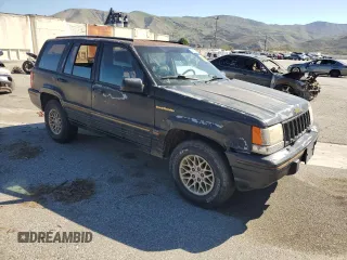 1993 Jeep Grand Cherokee Limited with VIN 1J4GZ78S3PC502345, listed as a Copart auction lot 46933805 with 121,652 mi miles and Salvage title. Bid and sale history available at DreamBid. Image 4.
