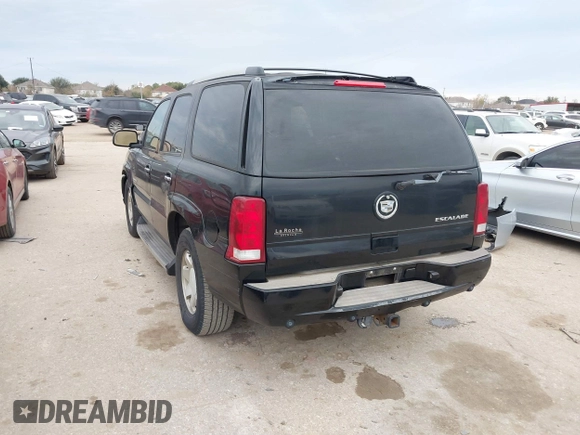 2003 Cadillac Escalade z VIN 1GYEC63T43R206146, wystawiony jako IAAI lot #41335727 z przebiegiem Nie podano mil oraz . Historia ofert i sprzedaży dostępna na DreamBid. Obrazek 3.