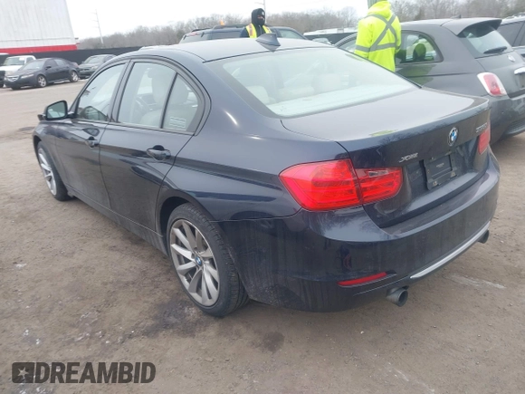 2013 BMW 3 Series 335i xDrive with VIN WBA3B9C50DJ899068, listed as a IAAI auction lot 41331622 with 156,216 mi miles. Bid and sale history available at carsss.com. Image 3.