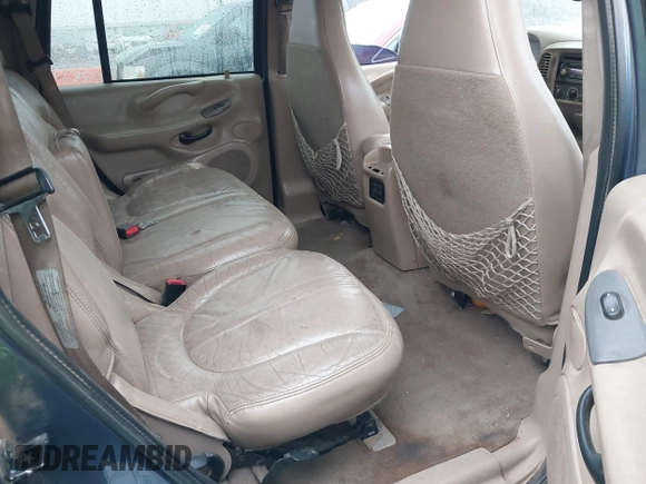 1998 Ford Expedition XLT z VIN 1FMPU18L4WLB36920, wystawiony jako IAAI lot #42192978 z przebiegiem Nie podano mil oraz . Historia ofert i sprzedaży dostępna na DreamBid. Obrazek 8.