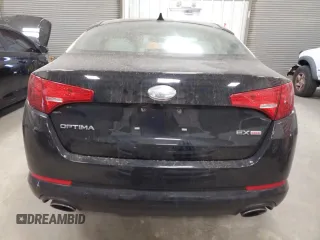 2013 Kia Optima EX z VIN 5XXGN4A73DG144469, wystawiony jako Copart lot #49736045 z przebiegiem 154 259 mil mil oraz Szkoda całkowita • Salvage title. Historia ofert i sprzedaży dostępna na DreamBid. Obrazek 6.