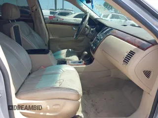 2006 Cadillac DTS 1SC z VIN 1G6KD57Y56U109483, wystawiony jako IAAI lot #42103757 z przebiegiem 106 746 mil mil oraz . Historia ofert i sprzedaży dostępna na DreamBid. Obrazek 5.
