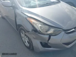 2013 Hyundai Elantra GLS PZEV with VIN KMHDH4AE9DU680860, listed as a IAAI auction lot 41068349 with 74,687 mi miles. Bid and sale history available at carsss.com. Image 12.