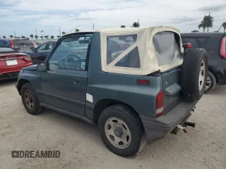 1994 Geo Tracker z VIN 2CNBE18U1R6918878, wystawiony jako Copart lot #75894834 z przebiegiem Nie podano mil oraz Nie do naprawy. Historia ofert i sprzedaży dostępna na DreamBid. Obrazek 2.