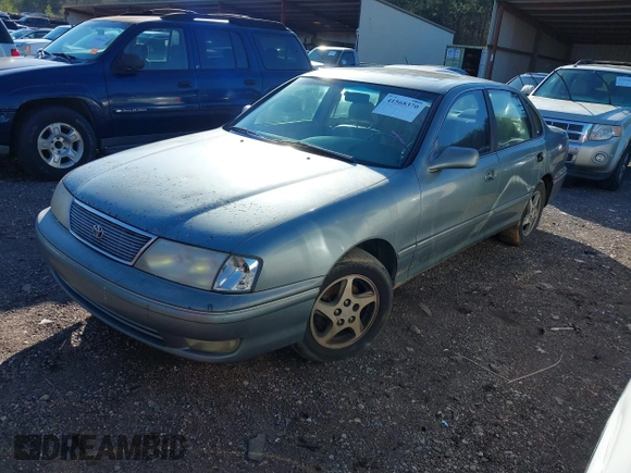 1998 Toyota Avalon XL with VIN 4T1BF18BXWU250149, listed as a IAAI auction lot 41568370 with 299,990 mi miles and . Bid and sale history available at DreamBid. Image 2.