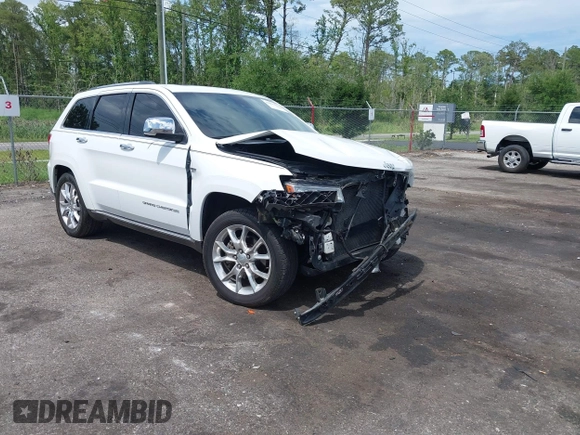 2014 Jeep Grand Cherokee Summit with VIN 1C4RJFJT6EC281114, listed as a IAAI auction lot 42497582 with 128,181 mi miles and . Bid and sale history available at DreamBid. Image 1.