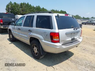 2004 Jeep Grand Cherokee Laredo with VIN 1J4GW48S94C369643, listed as a IAAI auction lot 42693998 with 225,033 mi miles and . Bid and sale history available at DreamBid. Image 3.