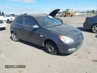 2007 Hyundai Accent SE with VIN KMHCN36C57U050943, listed as a IAAI auction lot 42795559 with 180,592 mi miles and . Bid and sale history available at DreamBid. Image 1.