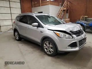 2014 Ford Escape Titanium с VIN 1FMCU0J94EUD41993, выставлен на аукционе Copart как лот 56933605 с пробегом 104 011 миль миль и Списание • Salvage title. История ставок и продаж доступна на DreamBid. Изображение 4.