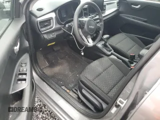 2023 Kia Rio S with VIN 3KPA24AD1PE531460, listed as a Copart auction lot 74285564 with 22,255 mi miles and Salvage Title. Bid and sale history available at DreamBid. Image 8.