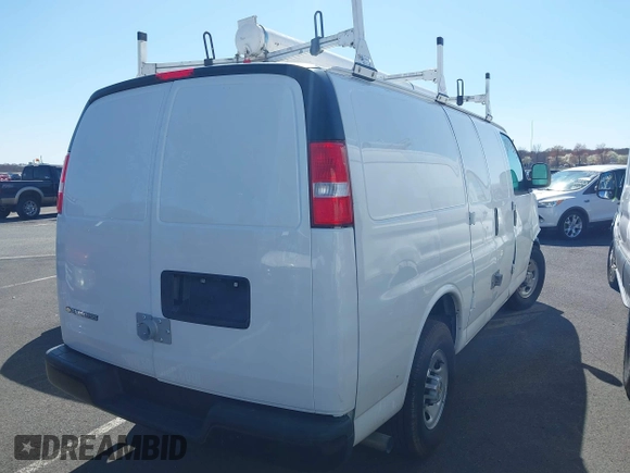 2024 Chevrolet Express Cargo with VIN 1GCWGAFPXR1274619, listed as a IAAI auction lot 41811735 with 11,970 mi miles and . Bid and sale history available at DreamBid. Image 4.
