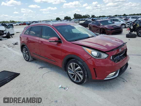 2018 Kia Niro Touring with VIN KNDCE3LC1J5111263, listed as a Copart auction lot 51804444 with 104,192 mi miles and Non Repairable. Bid and sale history available at carsss.com. Image 4.
