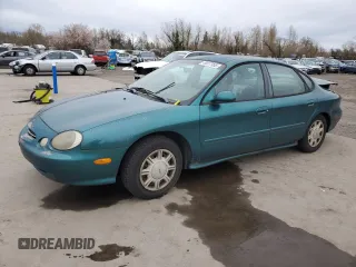 1998 Ford Taurus LX z VIN 1FAFP52U1WA103181, wystawiony jako Copart lot #49817955 z przebiegiem 196 913 mil mil oraz Szkoda całkowita • Salvage title. Historia ofert i sprzedaży dostępna na DreamBid. Obrazek 1.