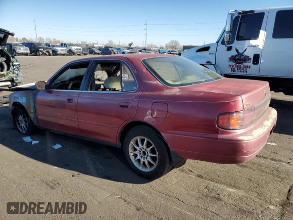 1993 Toyota Camry LE with VIN JT2SK12E8P0149731, listed as a Copart auction lot 83082154 with 197,590 mi miles and Salvage Title. Bid and sale history available at carsss.com. Image 2.