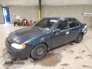1999 Toyota Corolla VE with VIN 2T1BR12E2XC136739, listed as a Copart auction lot 60693625 with 170,989 mi miles and Salvage title. Bid and sale history available at DreamBid. Image 1.