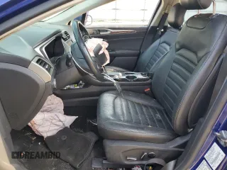 2013 Ford Fusion SE Hybrid z VIN 3FA6P0LU8DR295297, wystawiony jako Copart lot #61830065 z przebiegiem 190 096 mil mil oraz Czysty tytuł • Clean title. Historia ofert i sprzedaży dostępna na DreamBid. Obrazek 7.