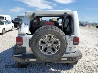 2013 Jeep Wrangler Unlimited Rubicon with VIN 1C4HJWFG4DL549356, listed as a Copart auction lot 46799055 with 172,327 mi miles and Salvage Title. Bid and sale history available at carsss.com. Image 6.