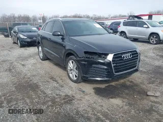 2018 Audi Q3 Premium Plus with VIN WA1JCCFS9JR033902, listed as a IAAI auction lot 41617460 with 97,771 mi miles. Bid and sale history available at carsss.com. Image 1.