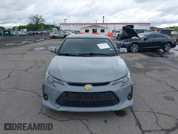 2014 Scion tC z VIN JTKJF5C71E3081033, wystawiony jako IAAI lot #42333111 z przebiegiem 144 124 mil mil oraz . Historia ofert i sprzedaży dostępna na DreamBid. Obrazek 12.