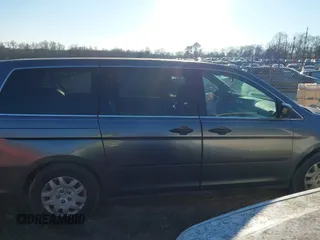 2010 Honda Odyssey LX with VIN 5FNRL3H28AB026712, listed as a IAAI auction lot 41281625 with 223,905 mi miles. Bid and sale history available at carsss.com. Image 13.