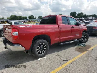 2021 Toyota Tundra SR with VIN 5TFUY5F11MX971951, listed as a Copart auction lot 64889875 with 69,297 mi miles and Salvage title. Bid and sale history available at DreamBid. Image 3.