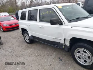 2014 Jeep Patriot Sport with VIN 1C4NJRBB1ED744101, listed as a IAAI auction lot 42009390 with 180,214 mi miles. Bid and sale history available at carsss.com. Image 6.