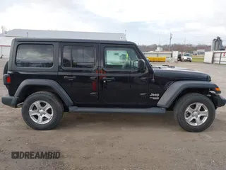 2018 Jeep Wrangler Unlimited Sport с VIN 1C4HJXDGXJW189576, выставлен на аукционе IAAI как лот 41906106 с пробегом 60 463 миль миль и . История ставок и продаж доступна на DreamBid. Изображение 13.