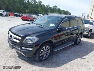 2013 Mercedes-Benz GL-Class GL 450 with VIN 4JGDF7CE4DA223010, listed as a IAAI auction lot 41888788 with 102,156 mi miles. Bid and sale history available at carsss.com. Image 2.