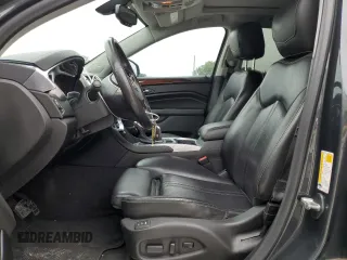 2015 Cadillac SRX Performance Collection with VIN 3GYFNCE38FS597717, listed as a Copart auction lot 57629615 with 102,689 mi miles and Salvage title. Bid and sale history available at DreamBid. Image 7.