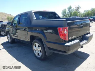 2011 Honda Ridgeline RTL with VIN 5FPYK1F50BB001442, listed as a IAAI auction lot 42023615 with 189,170 mi miles. Bid and sale history available at carsss.com. Image 3.
