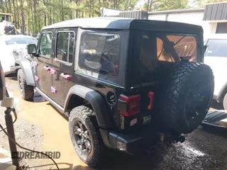 2021 Jeep Wrangler Unlimited Sport S with VIN 1C4HJXDG7MW714968, listed as a IAAI auction lot 41983752 with 50,980 mi miles. Bid and sale history available at carsss.com. Image 3.