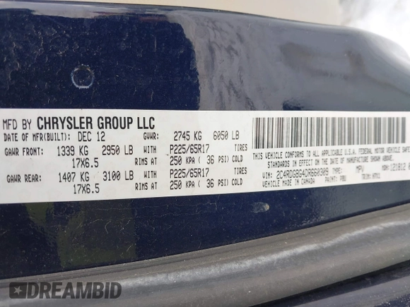 2013 Dodge Grand Caravan SE with VIN 2C4RDGBG4DR660309, listed as a IAAI auction lot 41531676 with 226,234 mi miles and . Bid and sale history available at DreamBid. Image 9.