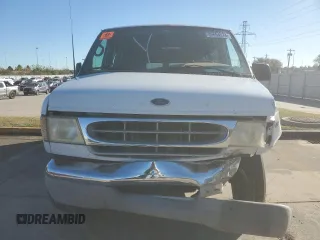 2002 Ford Econoline Passenger XL with VIN 1FBSS31S82HB36096, listed as a Copart auction lot 80654574 with 170,656 mi miles and Salvage title. Bid and sale history available at DreamBid. Image 5.