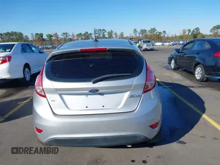 2019 Ford Fiesta SE with VIN 3FADP4EJ0KM107058, listed as a IAAI auction lot 40979683 with 116,854 mi miles. Bid and sale history available at carsss.com. Image 16.
