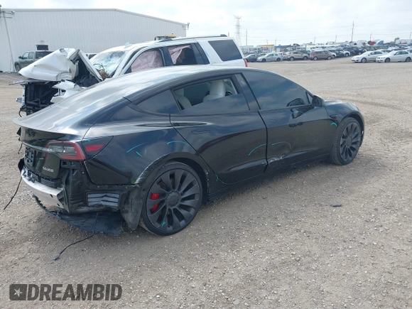 2021 Tesla Model 3 Performance with VIN 5YJ3E1EC5MF919278, listed as a IAAI auction lot 40194677 with 50,484 mi miles and . Bid and sale history available at carsss.com. Image 4.