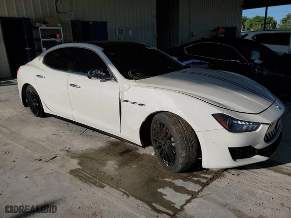 2018 Maserati Ghibli with VIN ZAM57XSA3J1273909, listed as a Copart auction lot 68951253 with 59,308 mi miles. Bid and sale history available at carsss.com. Image 4.