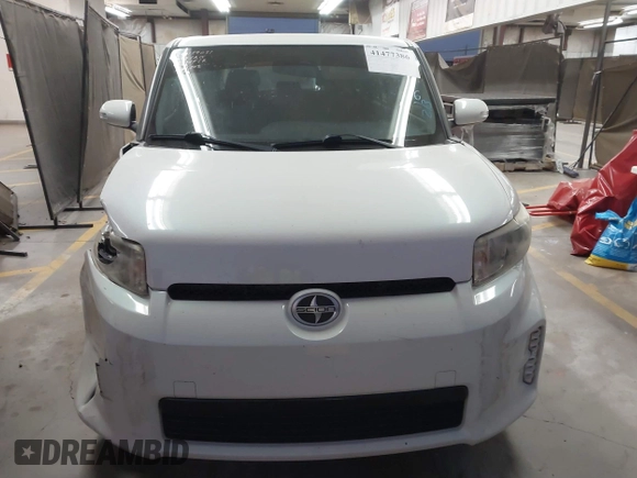 2014 Scion xB with VIN JTLZE4FE1EJ060281, listed as a IAAI auction lot 41477386 with 61,423 mi miles. Bid and sale history available at carsss.com. Image 12.
