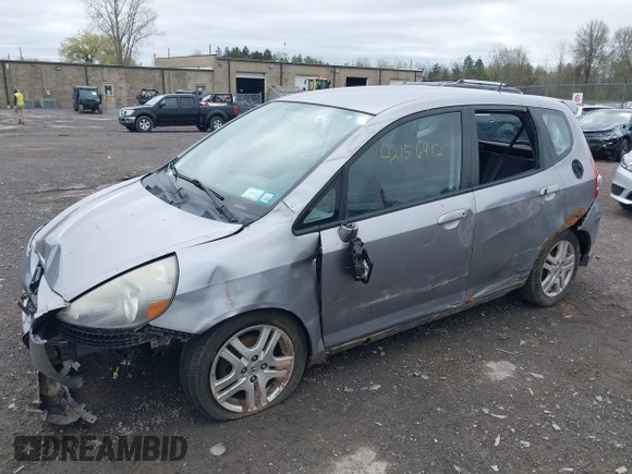 2007 Honda Fit Sport z VIN JHMGD38687S017199, wystawiony jako IAAI lot #42156912 z przebiegiem 194 685 mil mil oraz . Historia ofert i sprzedaży dostępna na DreamBid. Obrazek 18.