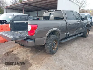 2016 Nissan Titan XD PRO-4X with VIN 1N6BA1F47GN504416, listed as a IAAI auction lot 41223650 with 168,440 mi miles. Bid and sale history available at carsss.com. Image 4.