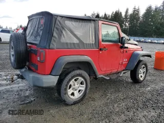 2009 Jeep Wrangler X with VIN 1J4FA24149L760959, listed as a Copart auction lot 49425955 with 128,813 mi miles and Salvage Title. Bid and sale history available at DreamBid. Image 3.